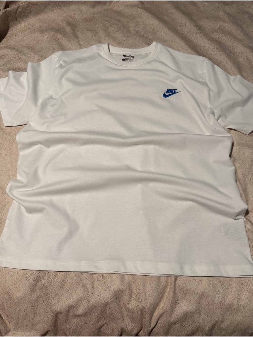 Nike Short Sleeve Tee in White with Blue Swoosh